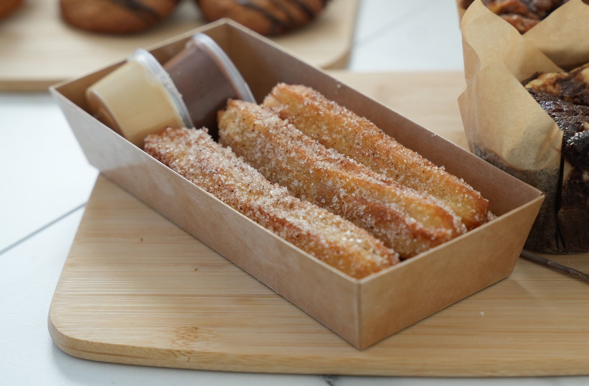 Freshly-fried churros with dipping sauces $22